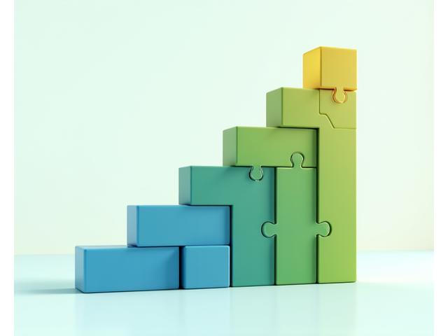 Symboles d'équilibre et de reconstruction financière, représentant un redressement d'entreprise.
